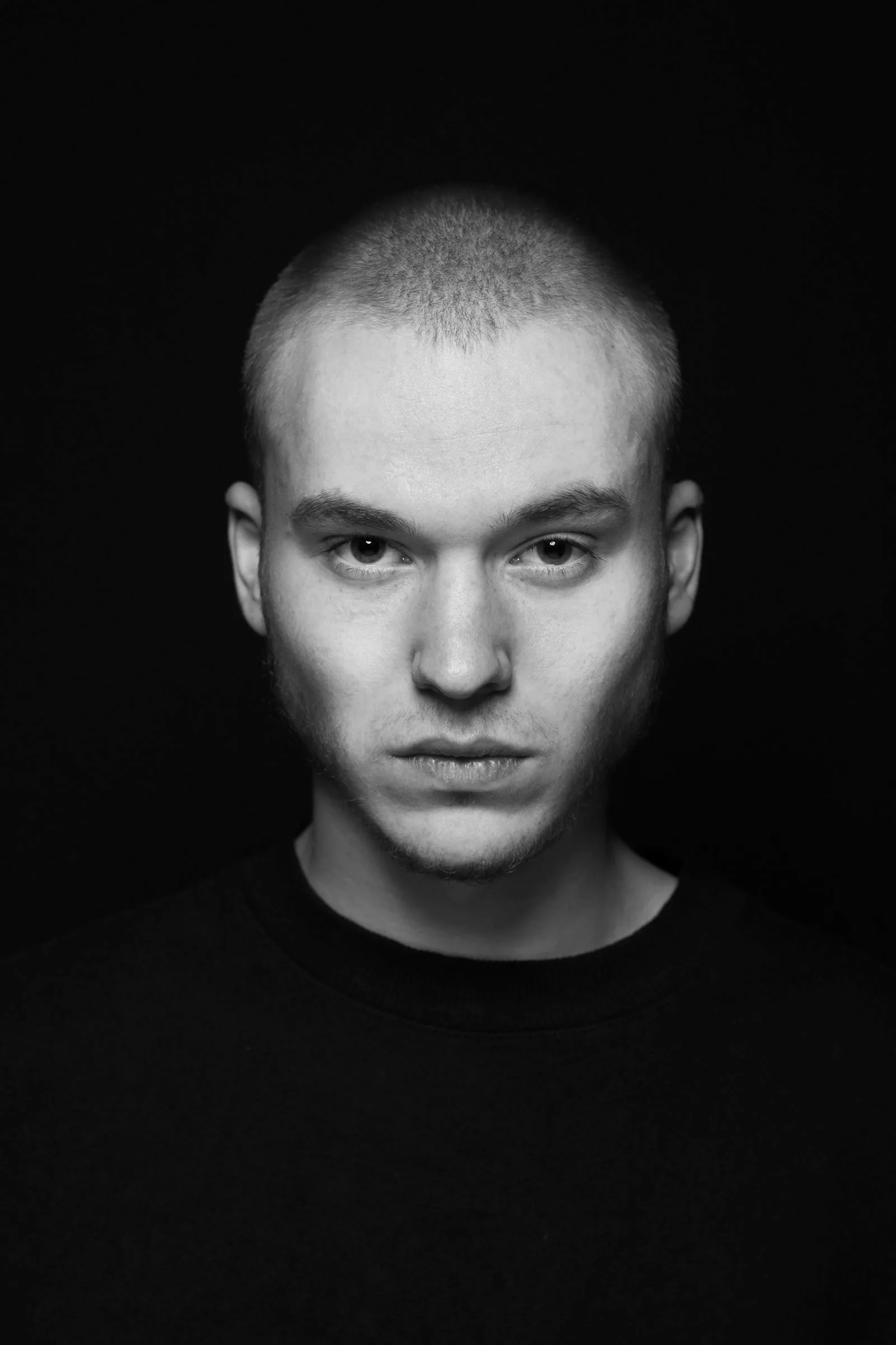 Portrait of a man in black